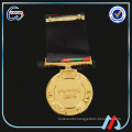 beautiful brass war military medal with ribbon